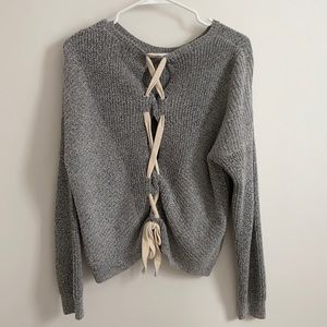 Laced back sweater size medium